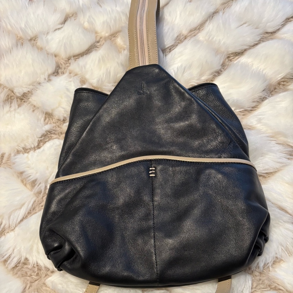 SK!N Sling Bag Made in Argentina New Condition